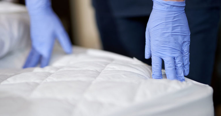 Hands on mattress